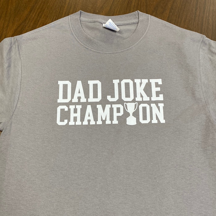Dad Joke Champion. $6 CLEARANCE TEES! $8 For Long Sleeves! Random Shirt Color Chosen.