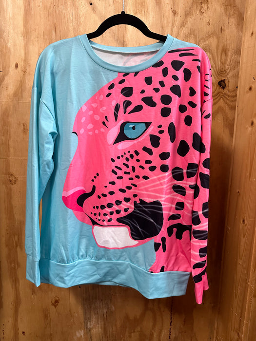 Turquoise Shirt with a Large Pink Cheetah going across the front & the sleeve.  Small - 2x
