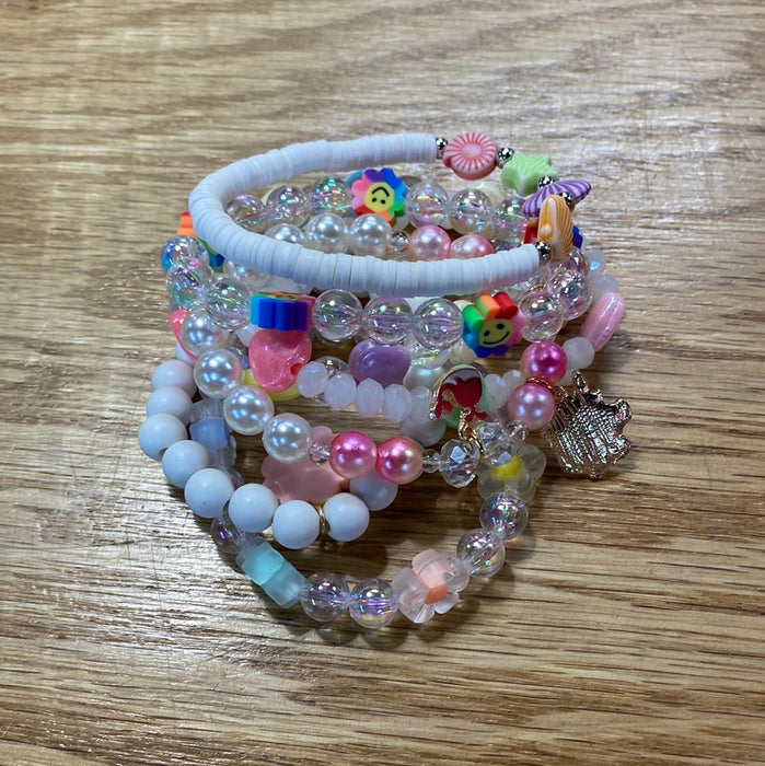 Kids Stack Bracelets - Grab Bag Style! What you see in the picture is a stack of bracelets.  You will get one bracelet in a color tone of your choice.