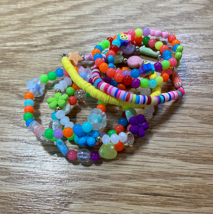 Kids Stack Bracelets - Grab Bag Style! What you see in the picture is a stack of bracelets.  You will get one bracelet in a color tone of your choice.
