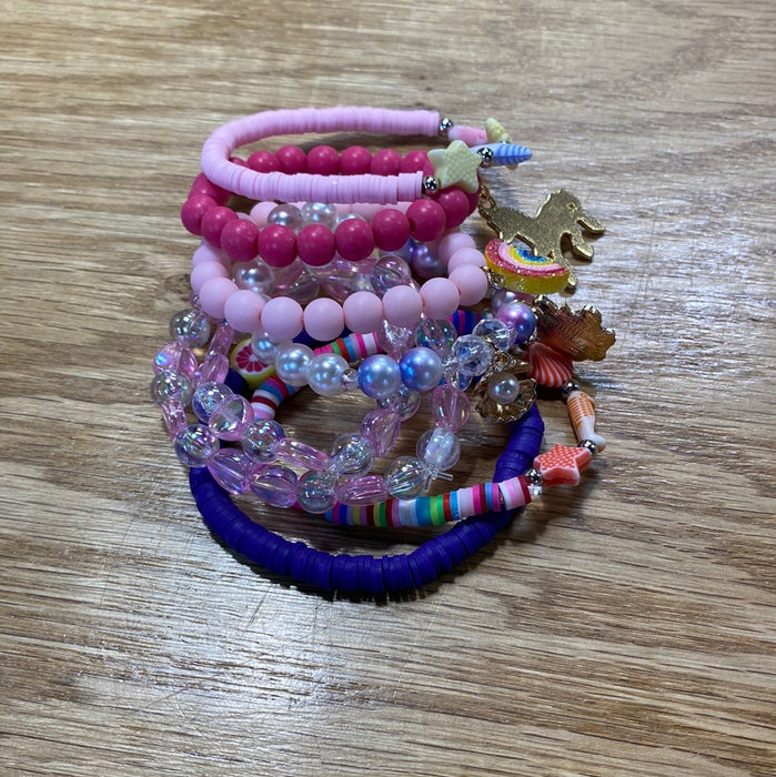 Kids Stack Bracelets - Grab Bag Style! What you see in the picture is a stack of bracelets.  You will get one bracelet in a color tone of your choice.