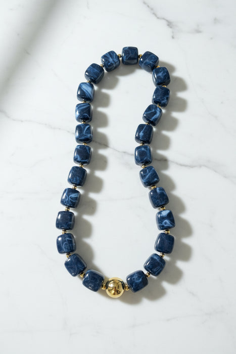 Navy Beaded Necklace with Gold Ball in the Center