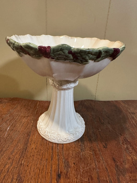 Vintage Christmas Pedestal Dish. It features Holly & Berries around the edge and says “Peace” in the center of Bowl