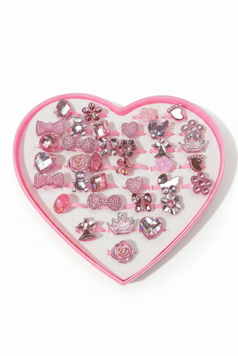 Assorted Pink Rings in Heart Box. Many styles including Bows, Butterflies, Hearts, and More!