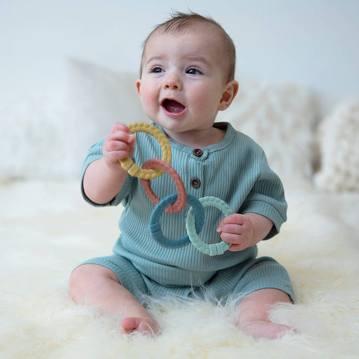 Bitzy Bespoke Itzy Rings™ Linking Ring Set: Muted Rainbow Color.  Use as a teether, toy, or to attach things to a stroller.