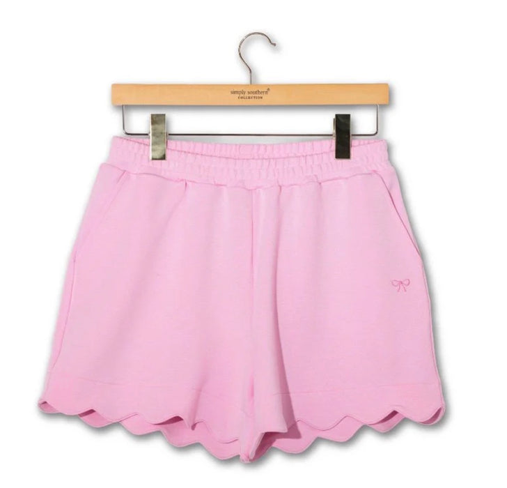 Simply Southern Scalloped Shorts.  Has a Small Embroidered Bow Detail.  So Soft!  Available in Blush & Sage Colors