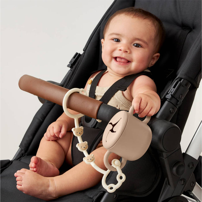 Itzy Strap™.  Use these to connect anything to your stroller, car seat, etc.