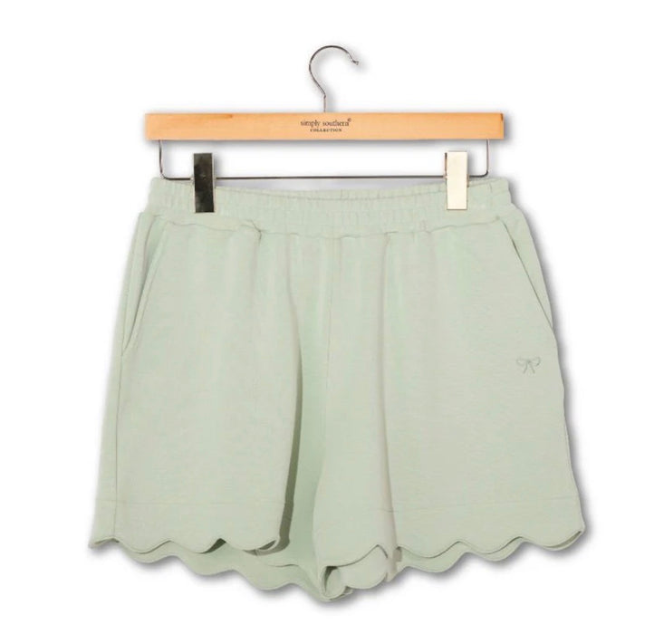 Simply Southern Scalloped Shorts.  Has a Small Embroidered Bow Detail.  So Soft!  Available in Blush & Sage Colors