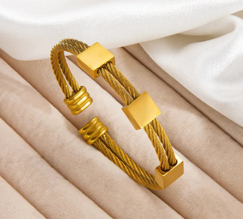 The Astra Bracelet – Stainless Steel Cable Cuff in Gold PVD
