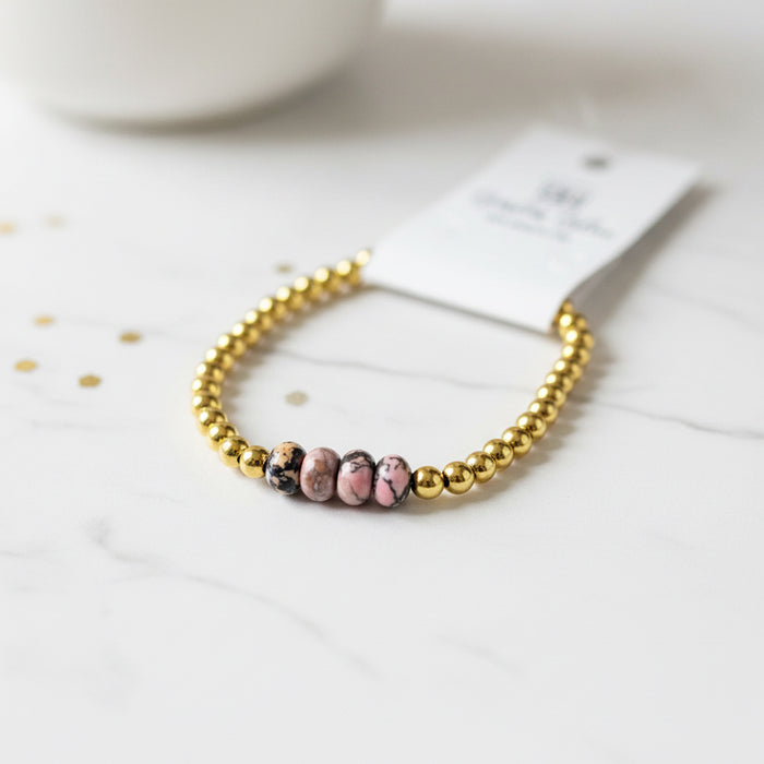 Gold Beaded Bracelet with 4 Black/Pink Beads