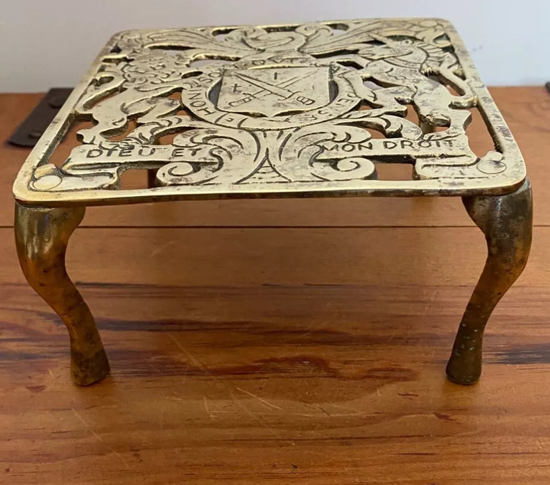 Vintage Brass Raised Trivet, Potholder, Kettle Stand, Plant Stand.  Features a Crest of the Royal Coat of Arms.