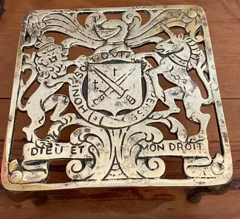 Vintage Brass Raised Trivet, Potholder, Kettle Stand, Plant Stand.  Features a Crest of the Royal Coat of Arms.
