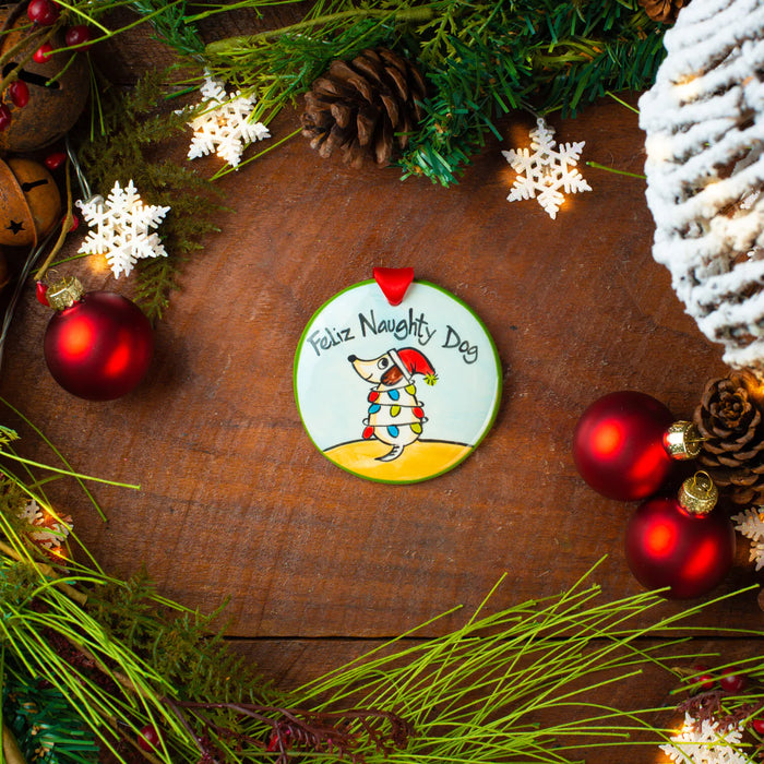 Feliz Naughty Dog Ornament.  Can be personalized with names, dates & more!