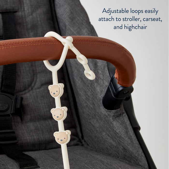 Itzy Strap™.  Use these to connect anything to your stroller, car seat, etc.