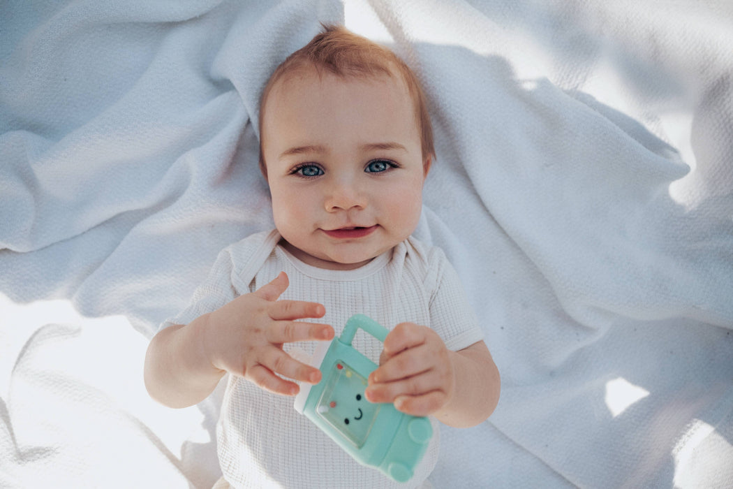 Sweetie Shake Plus™ - Teething + Rattle Toy: Tumbler