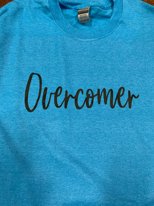 Overcomer.  $6 CLEARANCE TEES!  $8 For Long Sleeves!  Random Shirt Color Chosen.